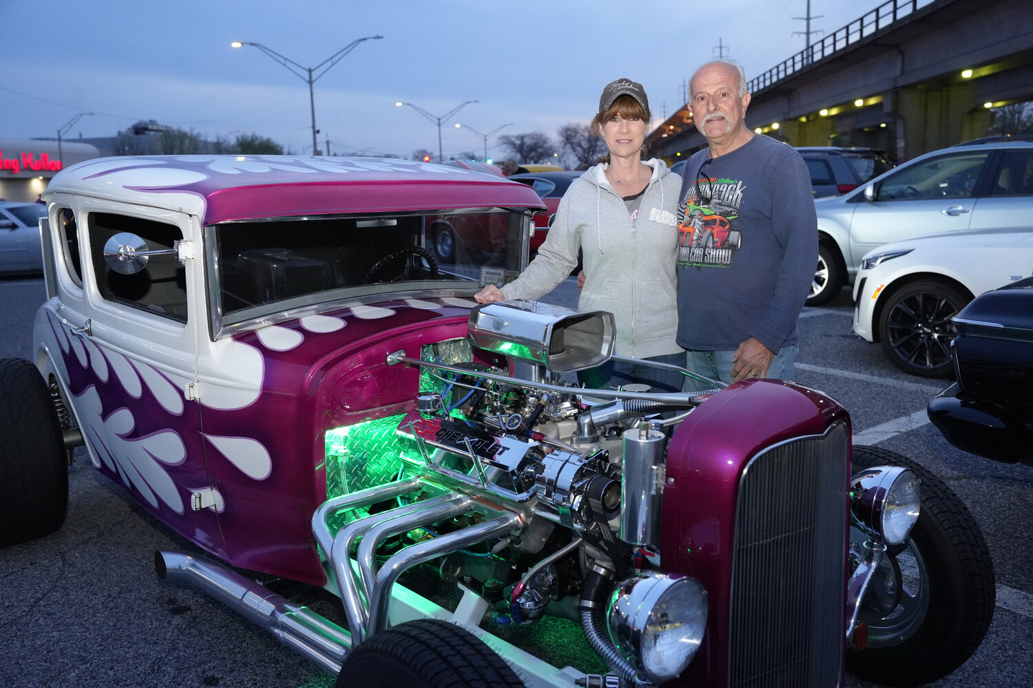 Friday night lights, with plenty of cars at the Bellmore Car Show